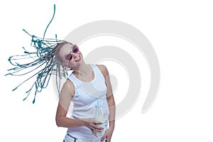 Winsome Smiling Caucasian Female with African American Dreadlocks Having Fun With Flyaway Hairs. Posing with Milk Bottle