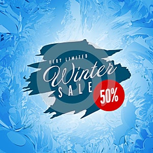 Winte sale label with frozen window background effect