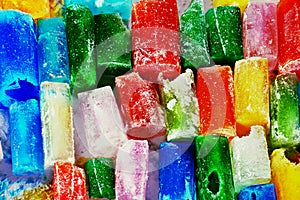 Winter abstract background with different colored ice bricks