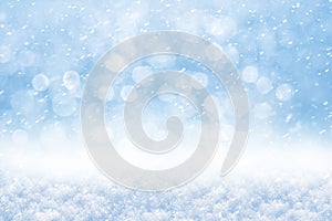 Winter abstract background with snow and blurred background with bokeh