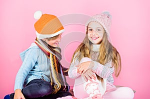 Winter accessories for kids. Girl and boy wear knitted winter hats. Winter season fashion accessories and clothes