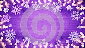 Winter / Advent / Christmas / holiday Background template - Frame made of ice crystals and sparkles bokeh lights on purple wooden