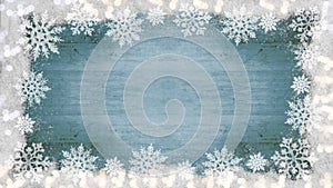 Winter / Advent / Christmas / holiday Background template - Frame made of snow with snowflakes, ice crystals on blue  wooden