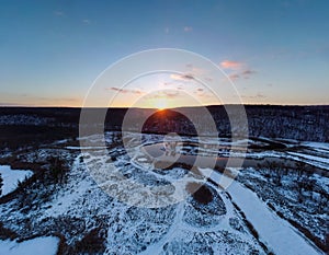 Winter aerial rural sunset on river panorama view