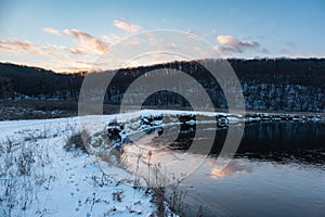 Winter aerial sunset view on river shore, Ukraine