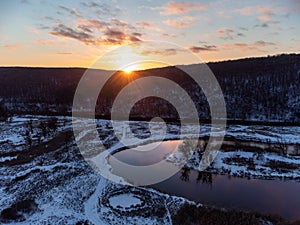 Winter aerial sunset view on river valley, Ukraine