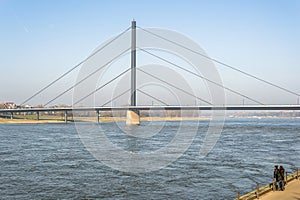 Winter afternoon at the Rhine River in DÃ¼sseldorf, in the background the Theodor Heuss cable-stayed bridge