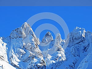 Winter ambience and beautiful idyllic atmosphere on the steep alpine rocky peak Schwarzchopf / 1950 m.a.s.l. / and the Alpstein