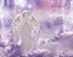 Winter angel with praying hands and a lot of stars