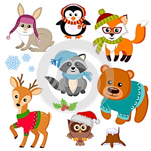 Winter animals in sweater, hat, scarf, glasses. Fox, bear, raccon, deer, owl, rabbit and penguin photo