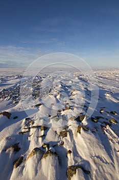 Winter arctic landscape with snow on the ground