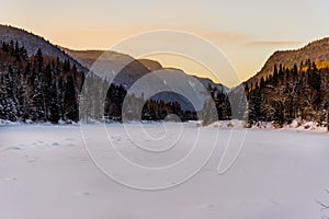 Winter arriving in Jacques Cartier Provincial Park, Quebec photo