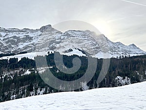 Winter atmosphere with the first snow on the slopes of the Alpstein mountain range in the Swiss Alps, UrnÃ¤sch or Urnaesch