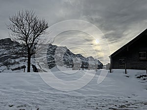 Winter atmosphere with the first snow on the slopes of the Alpstein mountain range in the Swiss Alps, UrnÃ¤sch or Urnaesch