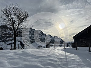 Winter atmosphere with the first snow on the slopes of the Alpstein mountain range in the Swiss Alps, UrnÃ¤sch or Urnaesch