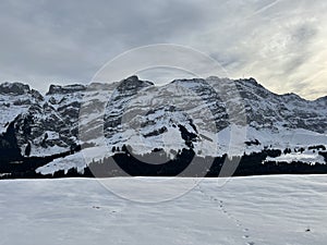 Winter atmosphere with the first snow on the slopes of the Alpstein mountain range in the Swiss Alps, UrnÃ¤sch or Urnaesch