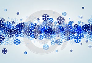 Winter background with blue snowflakes.