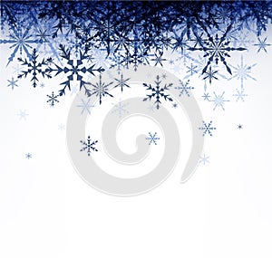 Winter background with blue snowflakes.