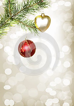 Winter background with a branch of a Christmas tree