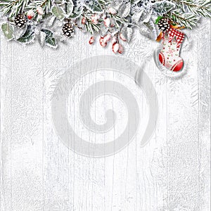 Winter background with Christmas Sock, holly and snowy branches