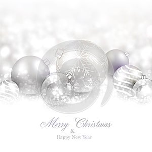 Winter background with silver christmas balls.