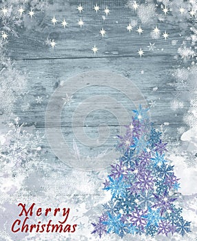 Winter Background with Snowflake Christmas Tree on Frozen Wood Textured Surface.