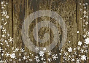 Winter background, snowflakes on a wooden background