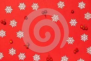 Winter banner. Red berry, white snowflakes in shape frame on red background for greeting card. Christmas, winter, new year concept