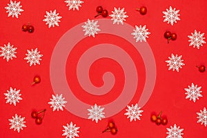 Winter banner. Red berry, white snowflakes in shape frame on red background for greeting card. Christmas, winter, new year concept