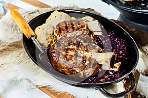 Winter barbecue with grilled pork hocks photo