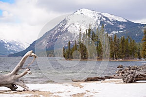 Winter beach of mountain lake