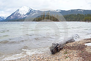 Winter beach of mountain lake