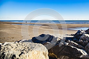 winter beaches panorama, lonely walk near the shore.