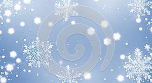 Winter blue background with snowflakes and bokeh, Christmas and New Year abstract backdrop