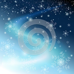 Winter blue sky with snowflakes and stars