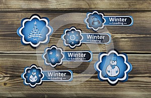 Winter blue stickers on wooden