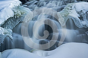 Winter Bond Falls Framed by Ice and Snow