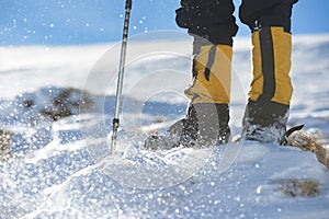 Winter boots, ski boots and ski poles are the basic equipment for winter mountaineers.