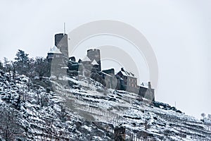 Winter at Burg Thurant Castle at the Mosel vineyards nestled in the hills above the Moselle River Germany Town Alken