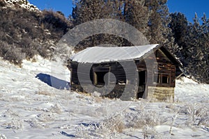 Winter Cabin Abandoned in the Wilderness photo