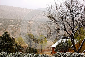 Winter cabin in mountains