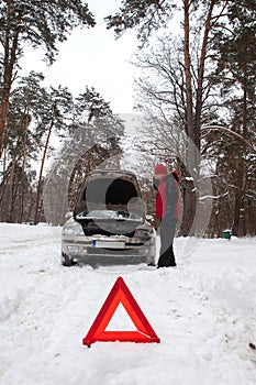 Winter car breakdown , car broken on a snowy winter road