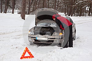 Winter car breakdown , car broken on a snowy winter road