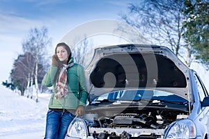 Winter car breakdown - woman call for help photo