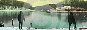 Winter carp fishing on the lake with snow and cold