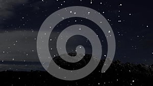 a winter christmas background with falling snow at night