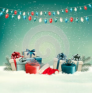 Winter christmas background with gifts and a garland. photo