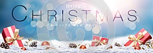 A winter Christmas message banner with red Christmas presents on a festive snow covered landscape