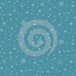 Winter christmas seamless pattern with small blue snowflakes on blue background