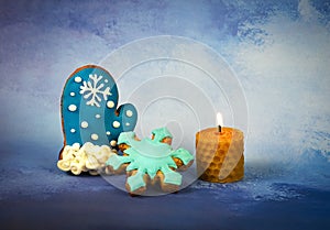 Winter Christmas still life with a candle and honey cake